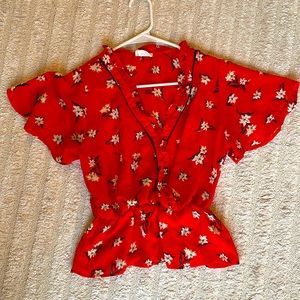 Red floral top with a synched waste